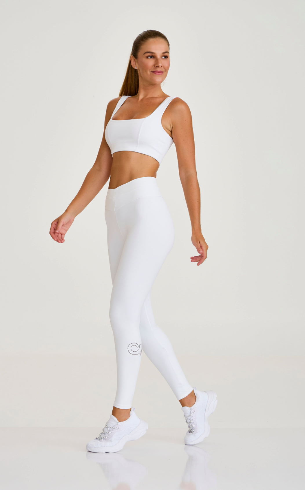 Dual legging with waist-cinching waistband